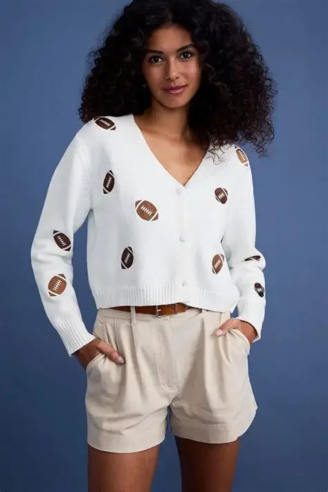 White cardigan with embroidered footballs