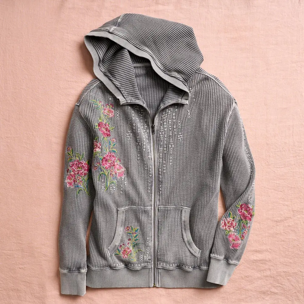 The Jolene Floral Hoodie in heather gray, a garment-washed waffle knit with floral embroidery